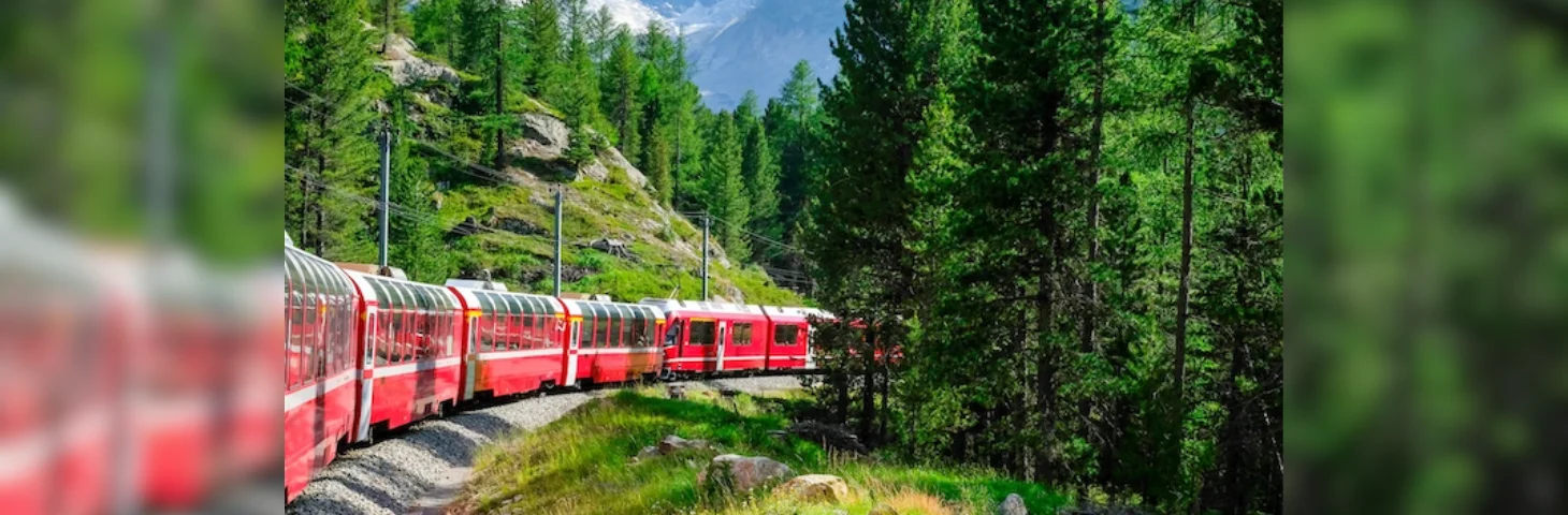 The Bernina Express travelling through the Swiss Engadin Alps.