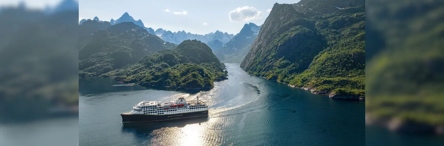 Image of a Havila vessel sailing in the Fjords