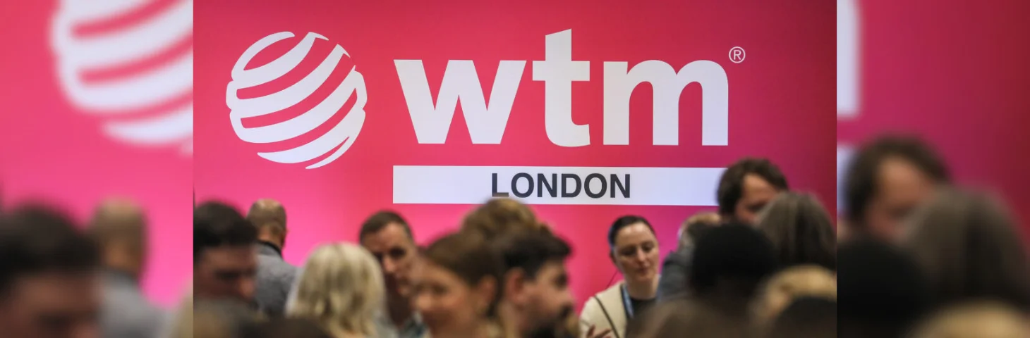 Attendees of World Travel Market London 2024 congregating at a conference session.